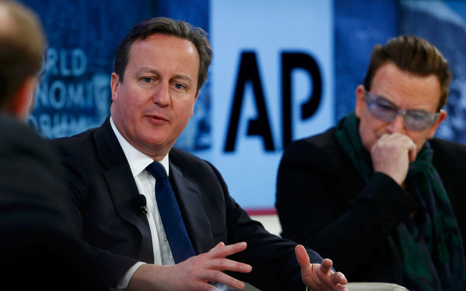 britains-prime-minister-david-cameron-and-singer-bono