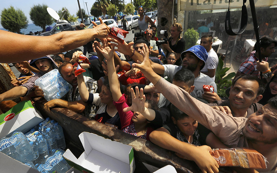 οηε-περισσότεροι-από-800-000-οι-μετανάστες-π-2110211