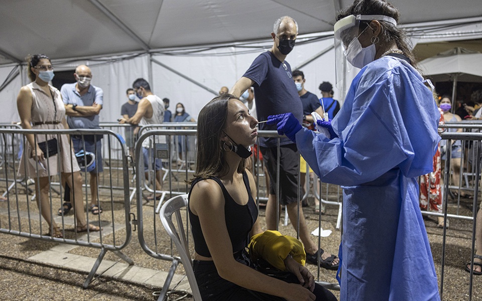 κορωνοϊός-νέο-ρεκόρ-κρουσμάτων-στο-ισ-561480604