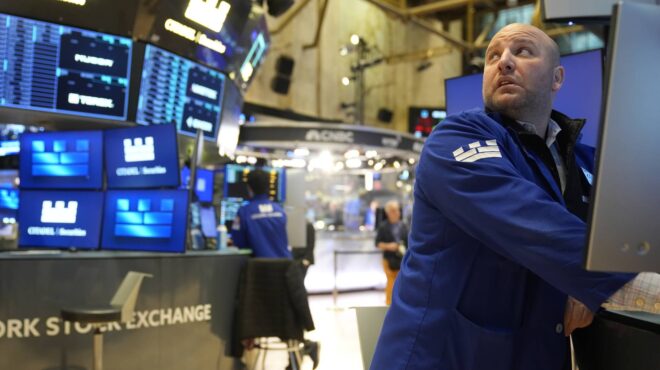 η-wall-street-σε-περιδίνηση-με-φόντο-τους-δασμού-563546920