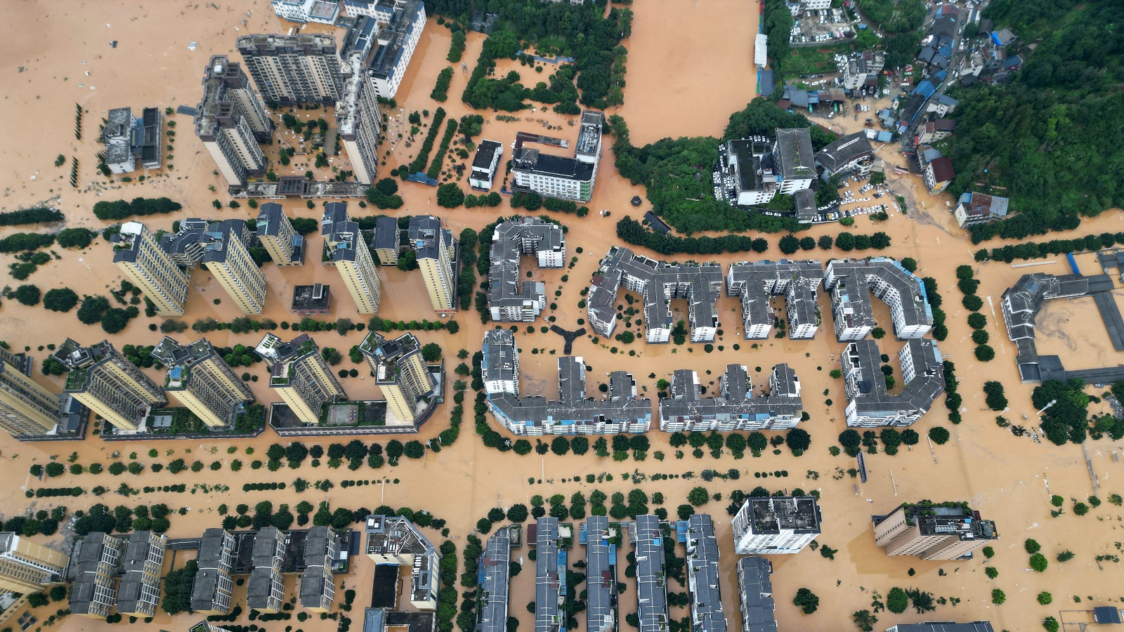 Κίνα: Πάνω από 80.000 άνθρωποι απομακρύνθηκαν εσπευσμένα εξαιτίας πλημμυρών στα νοτιοδυτικά [εικόνες]-1